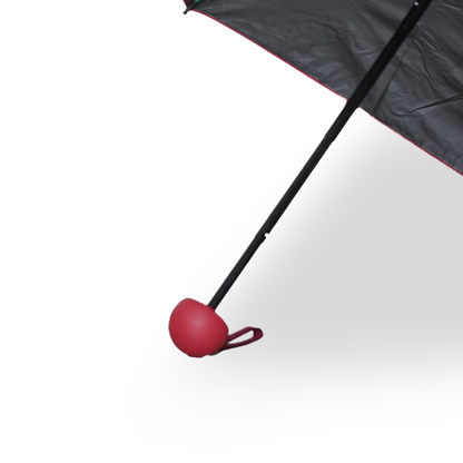 Black and red umbrella on a white background